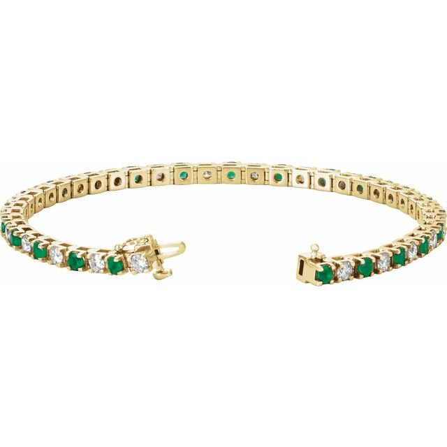 2 ⅓ CTW DIAMOND & EMERALD TENNIS BRACELET - Yellow Gold
