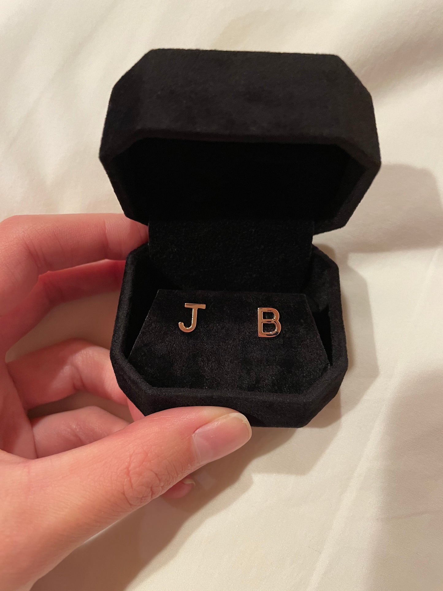 INITIAL EARRING(S)