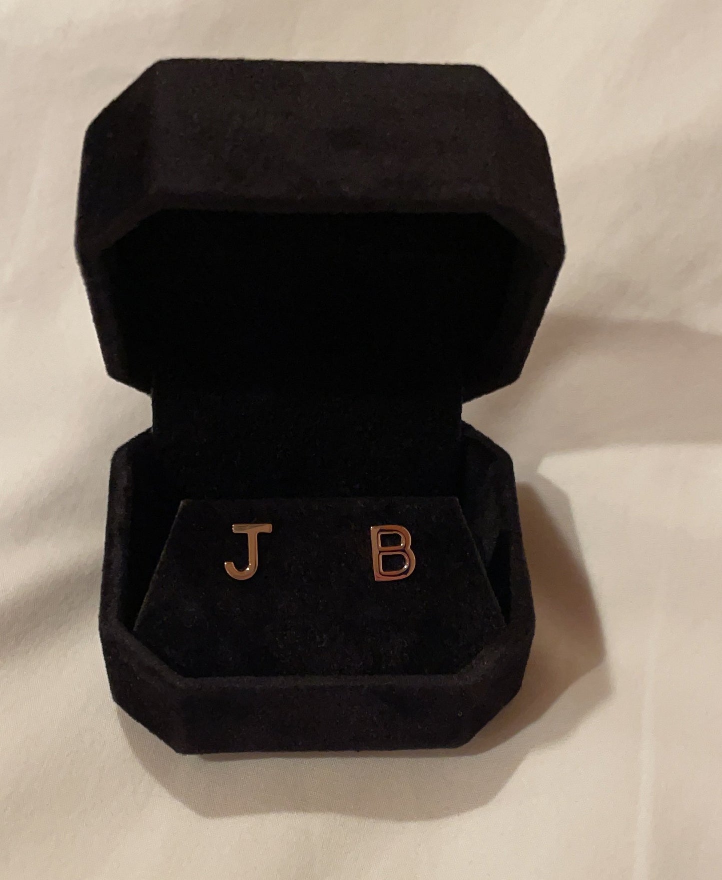 INITIAL EARRING(S)